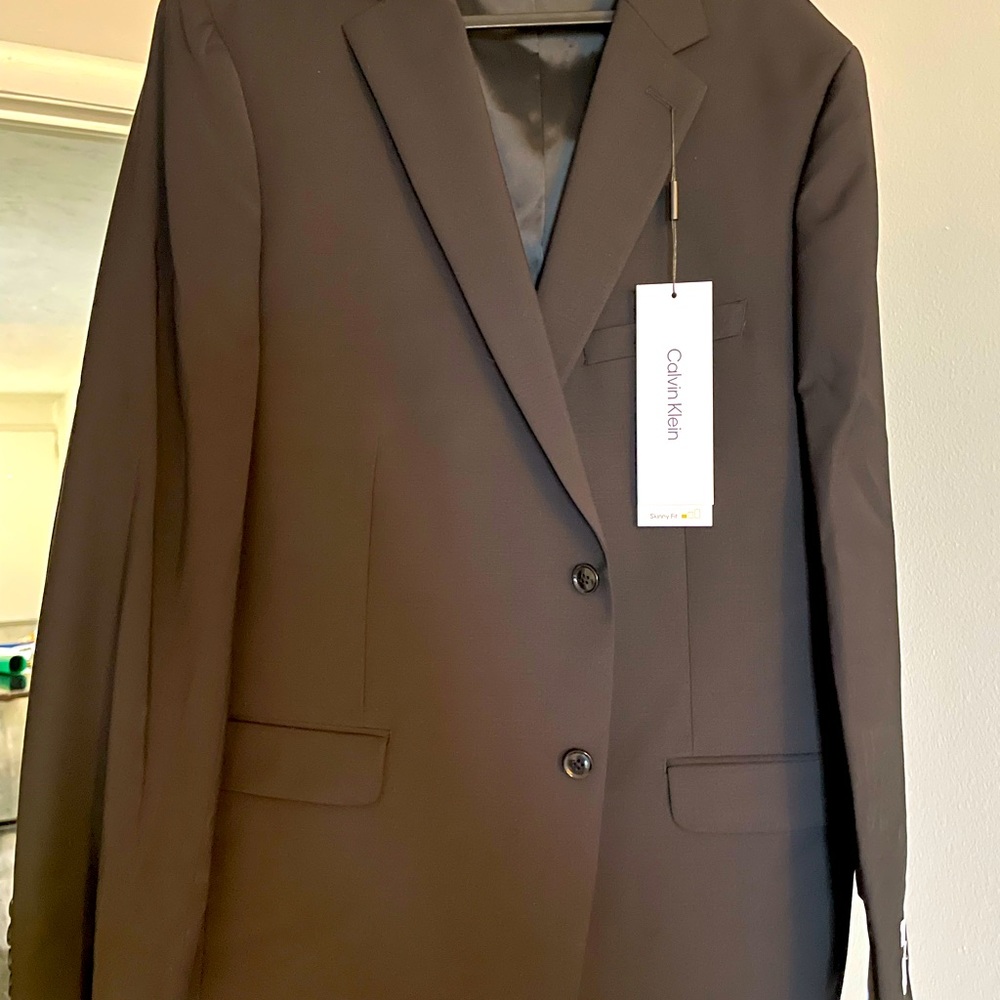 Brand new, black Calvin Klein suit jacket.